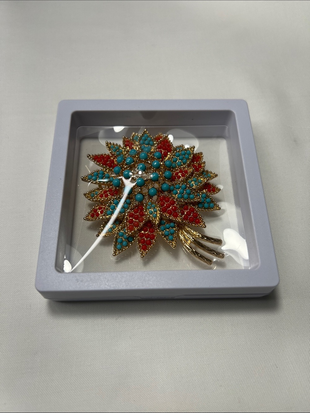 Gold Floral Cluster Brooch with Red and Turquoise Accents